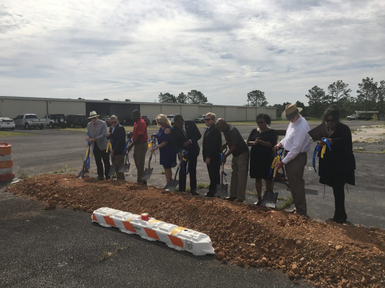 Officials from the city of Bessemer, the Bessemer Airport Authority, Jefferson County, ALDOT and Cadence Bank break ground on a $750,000 hangar project on Tuesday, June 25, 2019 at the Bessemer Municipal Airport.